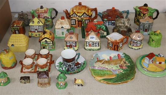 A quantity of cottage ceramic teapots / pastille burners